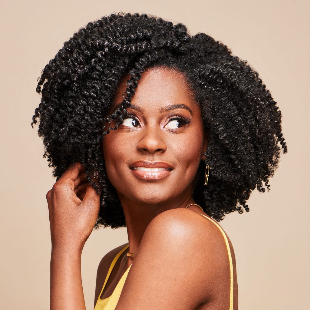 Model with Coconut Oil Baobab Oil Leave in Cream 18 Oz